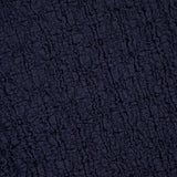 The Selah Sleeveless Stretch Tank by VERONICA BEARD features dark navy textured fabric with a crinkled, irregular surface and subtle diamond-lattice knit details, giving it a tactile, slightly wrinkled look.