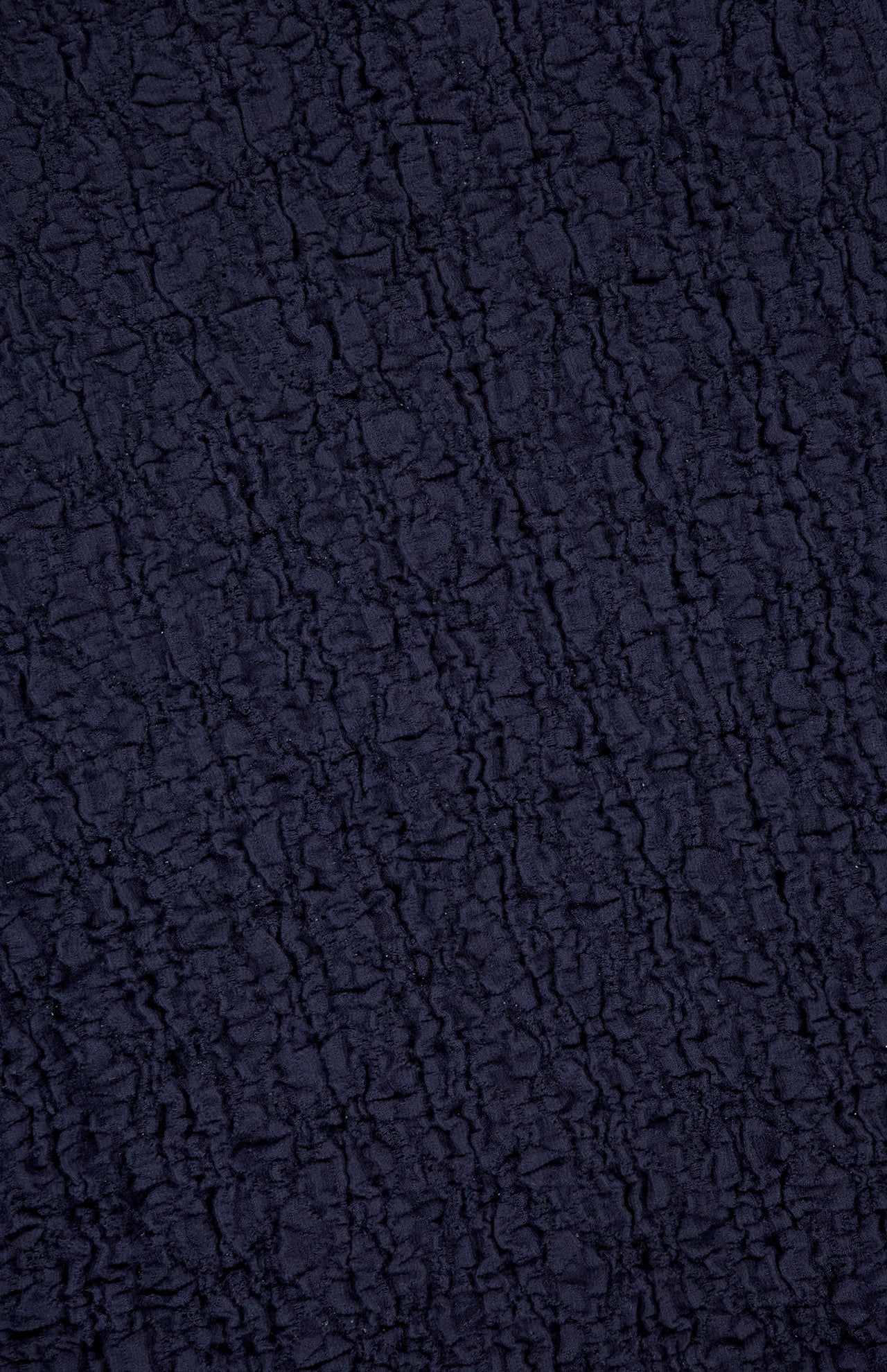 The Selah Sleeveless Stretch Tank by VERONICA BEARD features dark navy textured fabric with a crinkled, irregular surface and subtle diamond-lattice knit details, giving it a tactile, slightly wrinkled look.