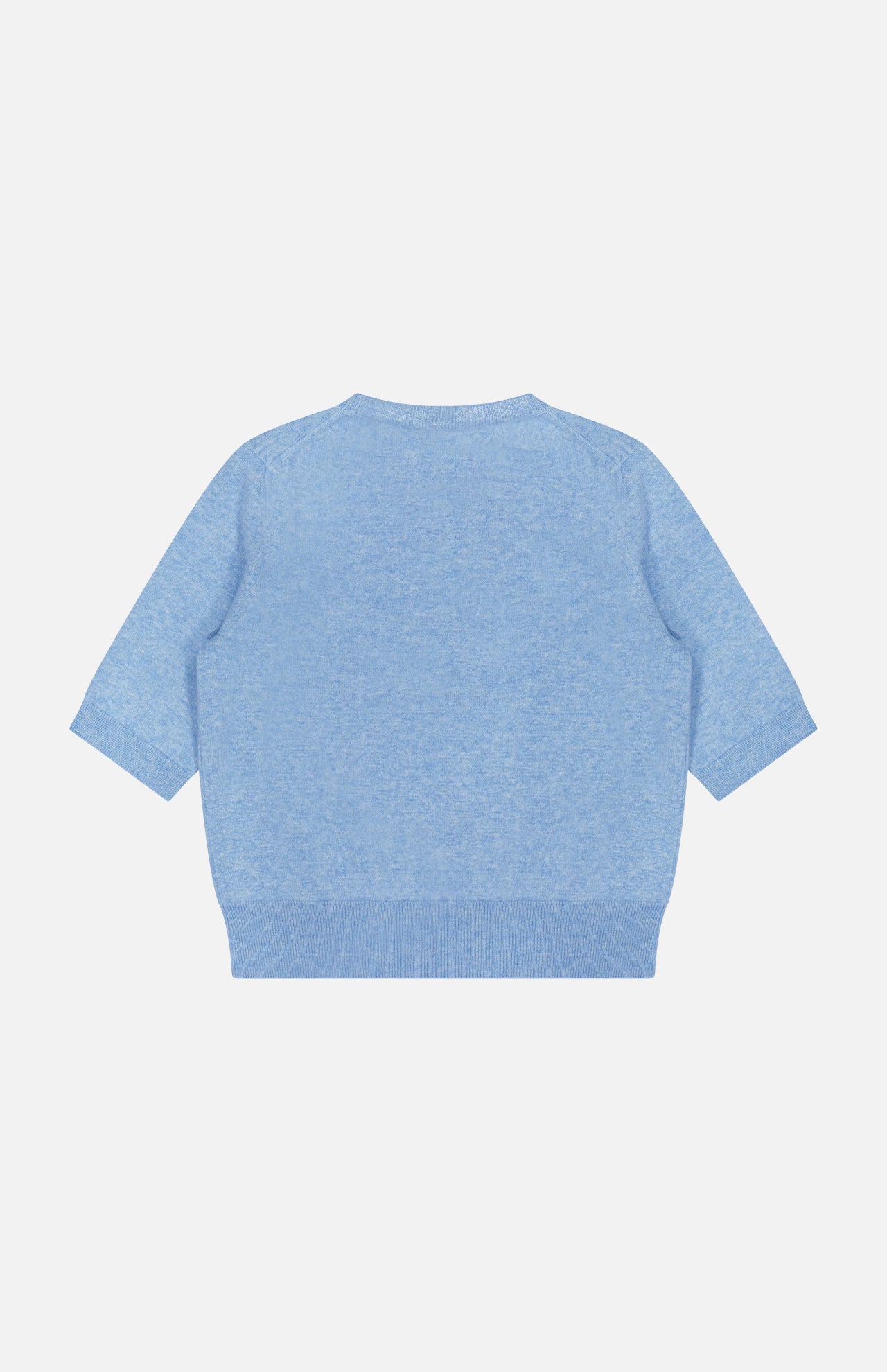 The Shana Cropped Cashmere Sweater by VERONICA BEARD is displayed flat on a white background, viewed from the back. This light blue, short-sleeve knit sweater features a relaxed fit with a round neckline and ribbed trim along the hem, sleeves, and collar. The design is clean and minimalist with no visible patterns or embellishments.