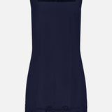 The Shanice Scalloped Lace Hem Dress by VERONICA BEARD is a sleeveless navy mini dress with a square neckline and delicate floral lace detailing along the hem, giving it an elegant, smooth, and solid look.