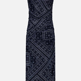 The Sylviani Bandana-inspired Midi Dress by VERONICA BEARD features a sleeveless bodycon fit, ruched sides, and a dark blue paisley pattern, showcased against a plain light background.