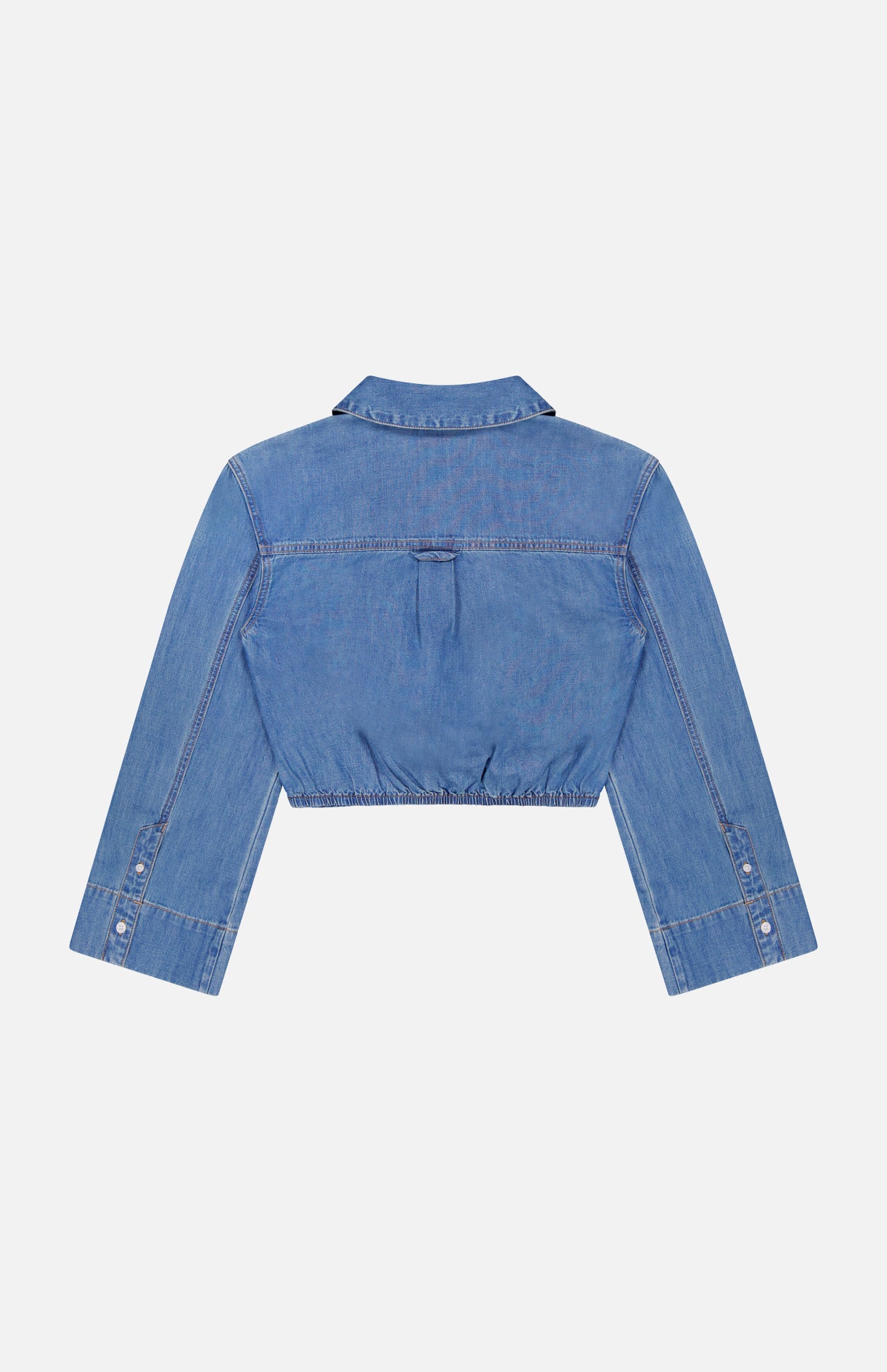 Back view of the VERONICA BEARD Timothy Twist Detail Shirt—a cropped denim shirt with collar, buttoned cuffs, twist waist detail, and visible seams—shown on a plain white background.