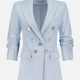 The Tomi Dickey Jacket by VERONICA BEARD is a pale blue Italian twill blazer, double-breasted with silver buttons, notched lapels, ruched long sleeves, two front flap pockets, dickey compatible, shown on a plain white background.