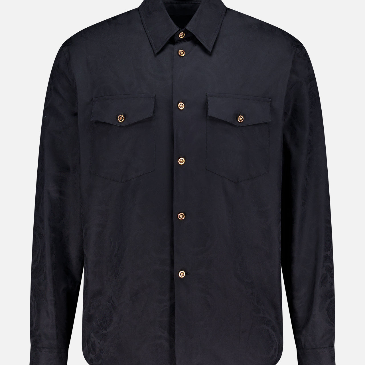 The VERSACE Baroque Jacquard Poplin Shirt features long sleeves, a black finish, two chest pockets, and signature Medusa buttons, shown against a plain white background.