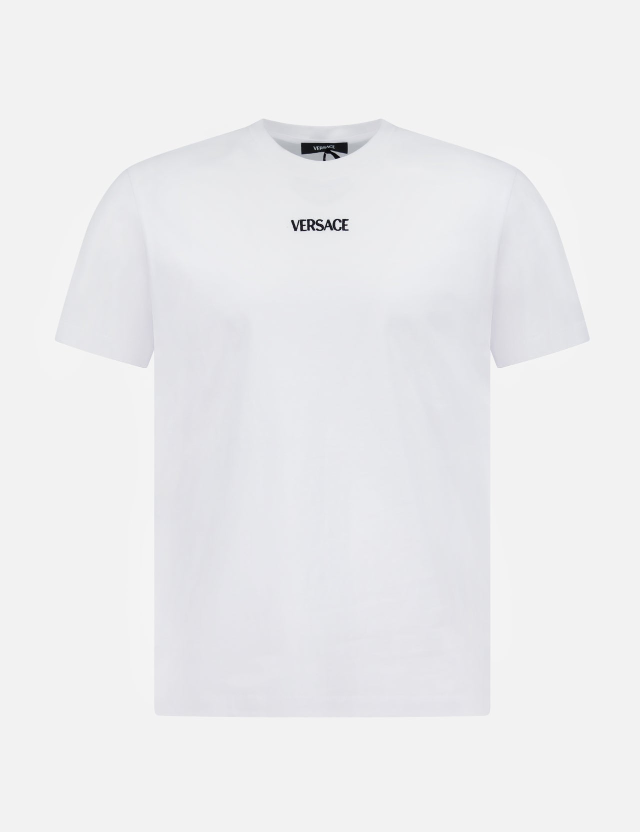 The Cotton Jersey Versace Embroidery T-shirt by VERSACE is a plain white short-sleeve tee featuring the brand’s name embroidered in black at the center chest—a modern classic of Italian menswear.