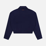 A Leather Patchwork Knit Jacket by VERSACE is shown from the back, featuring a small gold logo near the neckline. The jacket has a collar and straight hem, reflecting classic luxury Italian menswear style.