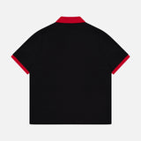 A black VERSACE Medusa Logo Embroidery Piquet Polo Shirt, shown from the back with red collar and sleeve cuffs on a white background—a sophisticated example of Italian menswear style.