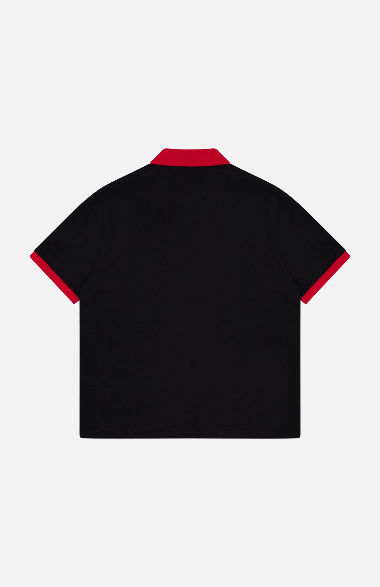 A black VERSACE Medusa Logo Embroidery Piquet Polo Shirt, shown from the back with red collar and sleeve cuffs on a white background—a sophisticated example of Italian menswear style.