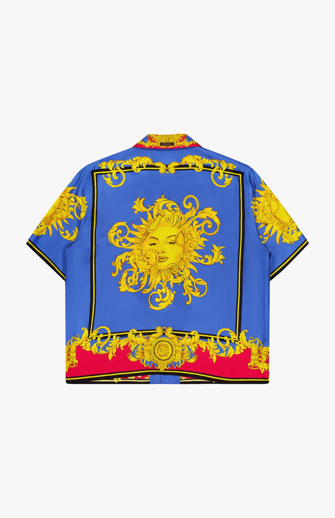 The VERSACE Silk Twill Print The Sun Shirt is a short-sleeve button-up featuring bold blue, red, and black Baroque prints, ornate yellow patterns, and a large stylized sun with a face on the back—ideal for luxe Italian style lovers.