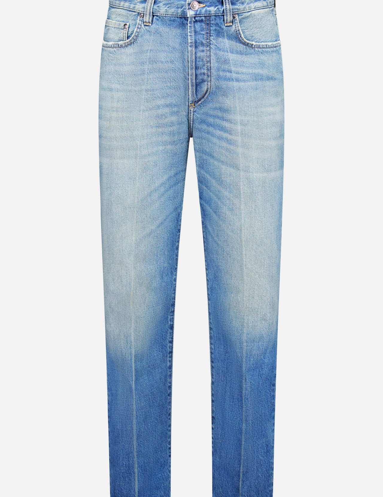 Versace Stone Washed Rigid Jeans for men in light blue feature a high waist, button and zipper closure, five pockets, and a unique faded wash that gradually shifts to a darker blue at the hem. Displayed front-facing on a white background, these straight-leg designer jeans offer both style and sophistication.