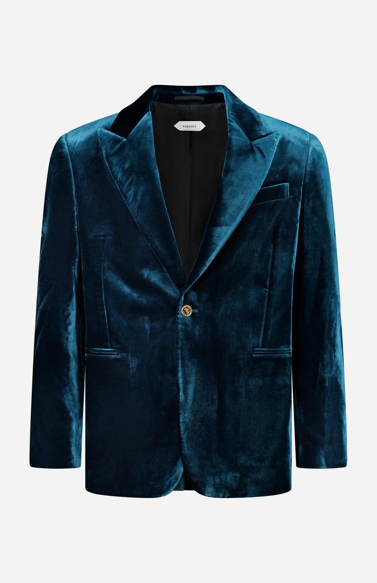 Introducing the VERSACE Viscose Silk Liquid Velvet Evening Jacket—a men’s luxury blazer crafted in sumptuous teal velvet, featuring a single-button closure, notched lapels, and front pockets. This sophisticated piece evokes the hallmark elegance of a classic Versace evening jacket and is showcased against a crisp white background.