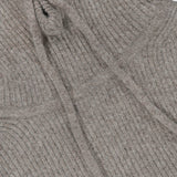 Close-up of the WHITE + WARREN Cashmere Blend Balaclava in gray, featuring ribbed knit texture, visible drawstrings, and a chest seam that highlights the plush fabric details—offering a cozy, form-fitting design with pullover appeal.