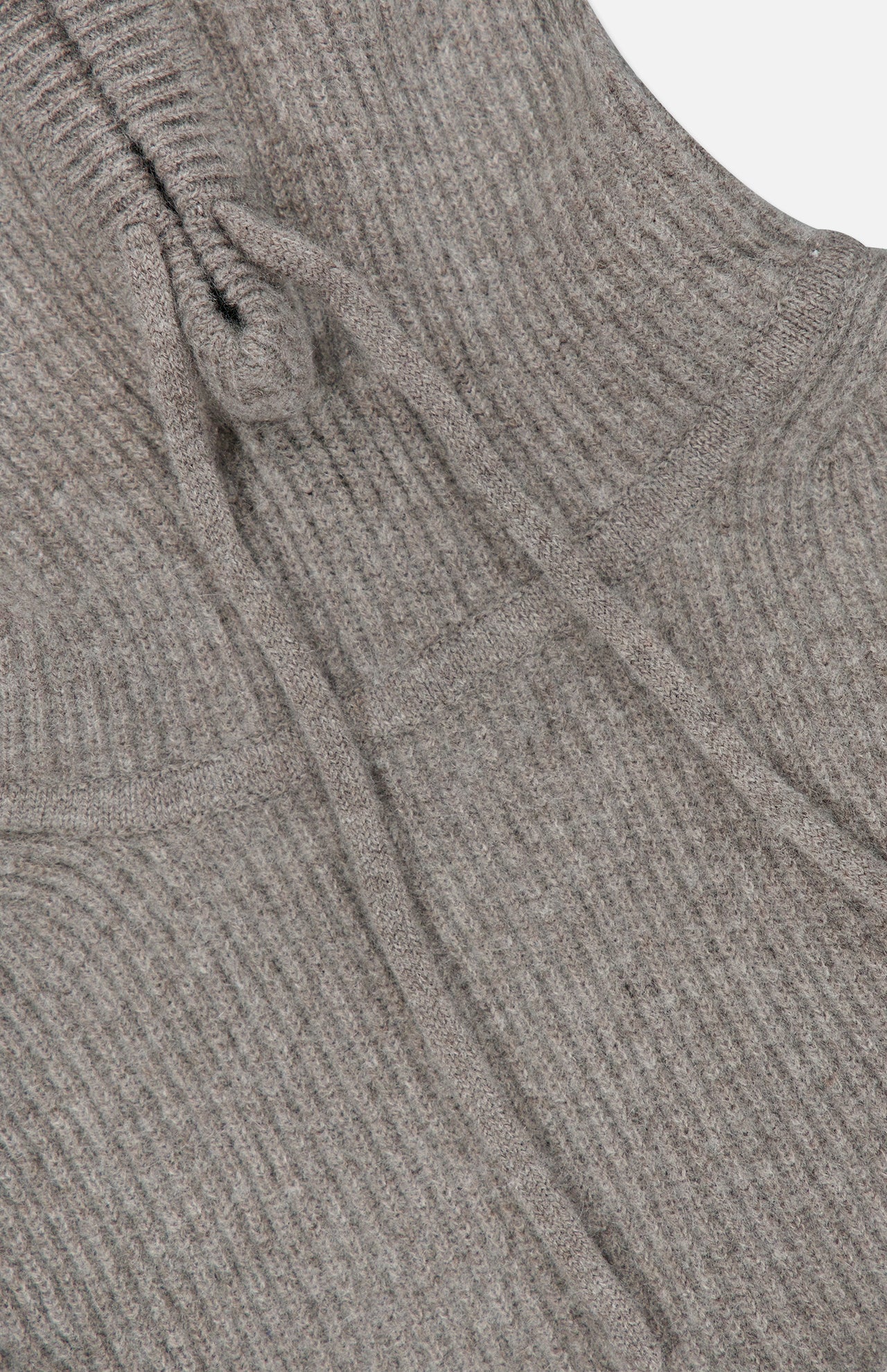 Close-up of the WHITE + WARREN Cashmere Blend Balaclava in gray, featuring ribbed knit texture, visible drawstrings, and a chest seam that highlights the plush fabric details—offering a cozy, form-fitting design with pullover appeal.