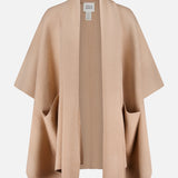 The WHITE + WARREN Cashmere Blend Poncho with Attached Scarf, shown in a camel shade on a white background, features an open-front design with wide sleeves and two spacious front pockets—an elegant women’s beige poncho that makes the perfect gift.