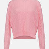 The WHITE + WARREN Cashmere Cable Crewneck Sweater in light pink features long sleeves and a classic cableknit design, finished with ribbed cuffs, hem, and neckline; shown against a plain white background.