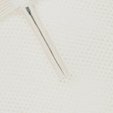 Close-up of the WHITE + WARREN Cashmere Mesh Polo Shirt, featuring a zippered neckline and ribbed collar that highlight its refined mesh texture.