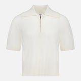 The WHITE + WARREN Cashmere Mesh Polo Shirt features short sleeves, a ribbed collar, and a zippered neckline, shown against a plain white background.