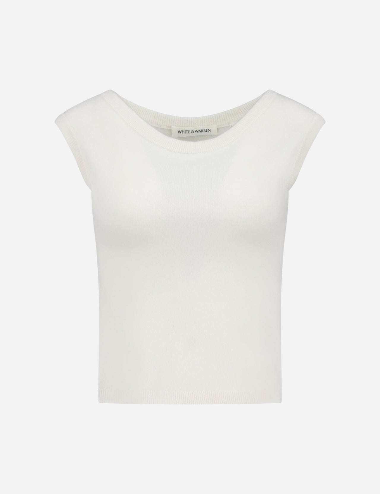 The WHITE + WARREN Cashmere Off Shoulder Top is a white, slim-fit, cropped knit with a wide round neckline and sleeveless design, shown against a plain light background.