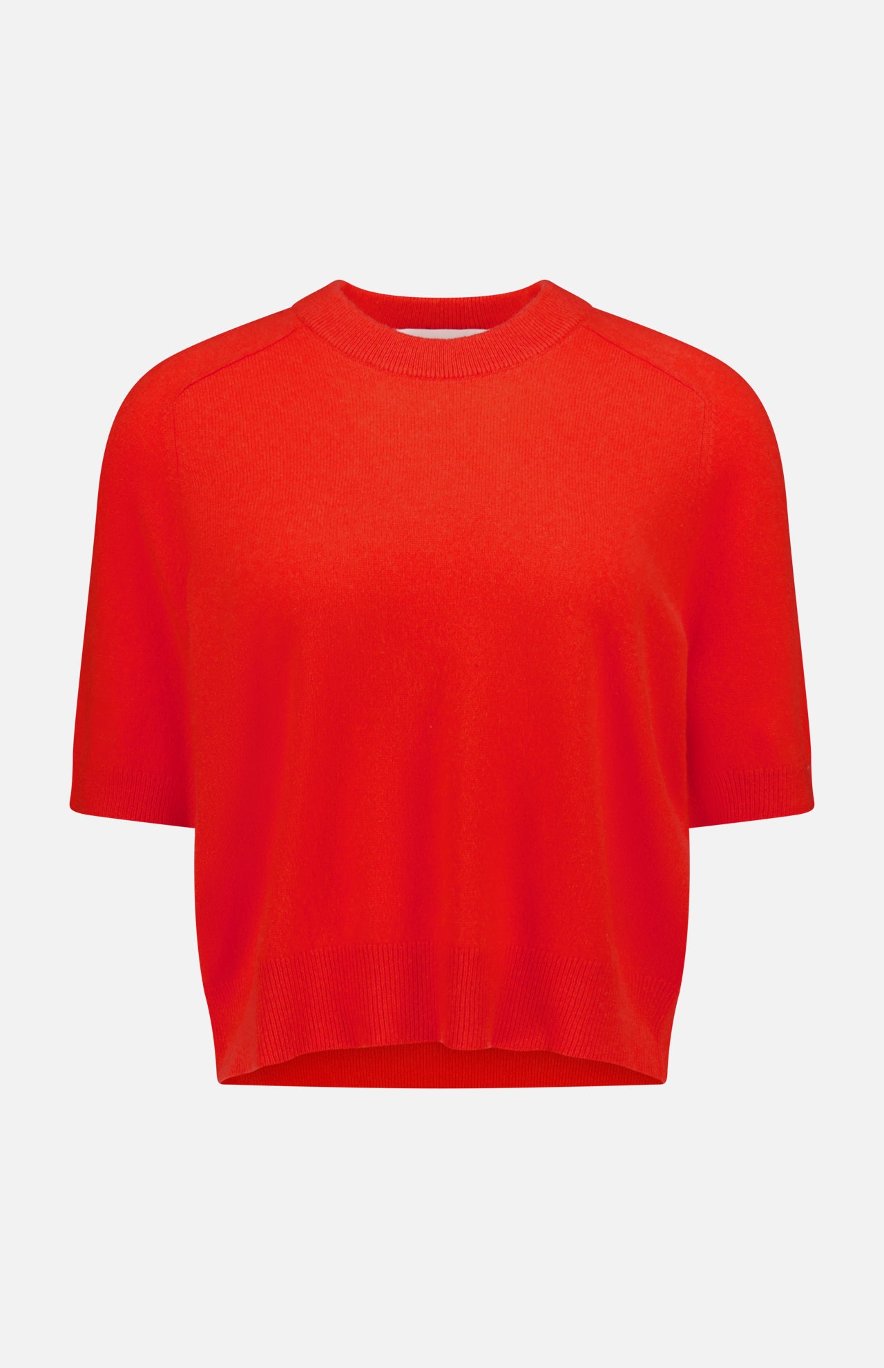 The WHITE + WARREN Cashmere Relaxed T-Shirt features a poppy red hue, short sleeves, a crew neckline, and ribbed hems in a relaxed fit, shown against a plain white background.