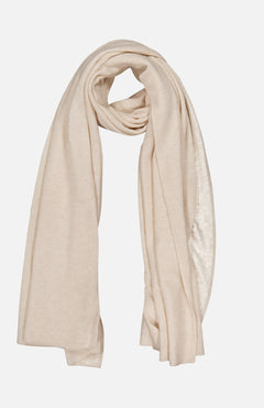 The WHITE + WARREN Cashmere Travel Wrap in light beige is displayed in a loose, circular fold against a plain white background.