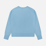A WHITE + WARREN Cashmere V-neck Sweater in light blue is displayed laid flat with the back facing up against a white background. This cozy cashmere piece features long sleeves, offering a versatile and stylish addition to any wardrobe.