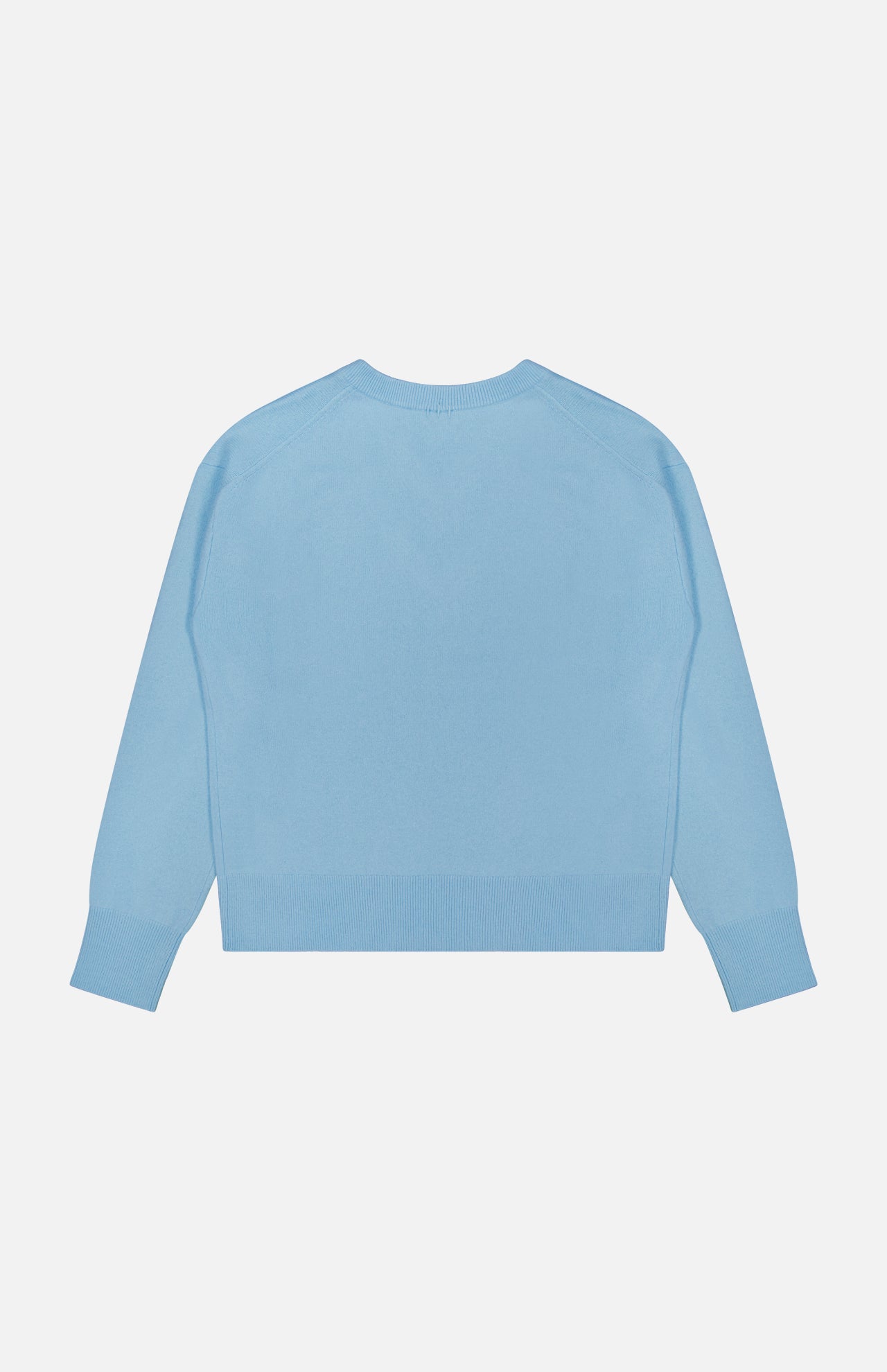 A WHITE + WARREN Cashmere V-neck Sweater in light blue is displayed laid flat with the back facing up against a white background. This cozy cashmere piece features long sleeves, offering a versatile and stylish addition to any wardrobe.