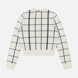 The WHITE + WARREN Cashmere Windowpane Cardigan Sweater, featuring a black windowpane pattern on white, is laid flat and displayed from the back against a plain white background.