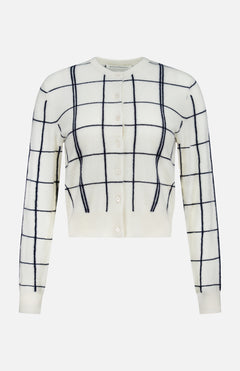 The WHITE + WARREN Cashmere Windowpane Cardigan Sweater is crafted from luxurious off-white cashmere, featuring long sleeves, a navy blue windowpane pattern, and white buttons down the front.