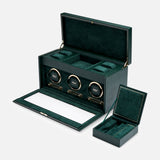 The WOLF British Racing Triple Watch Winder, showcased in green velvet, features three round watch winders, generous watch storage space, and comes with an additional small green velvet jewelry box—all elegantly arranged against a plain background.
