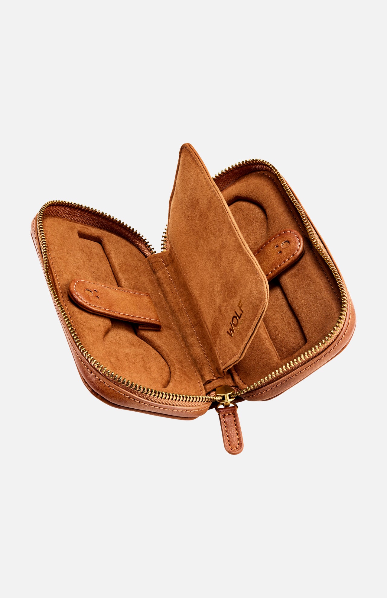 Introducing the WOLF Brogue 2 Piece Watch Zip Case—a brown leather watch case from the Brogue Collection. Featuring a zippered closure, a luxurious suede interior, and dedicated compartments with loops to securely store two watches or other small valuables, this case is the perfect choice for stylish and secure luxury watch storage.