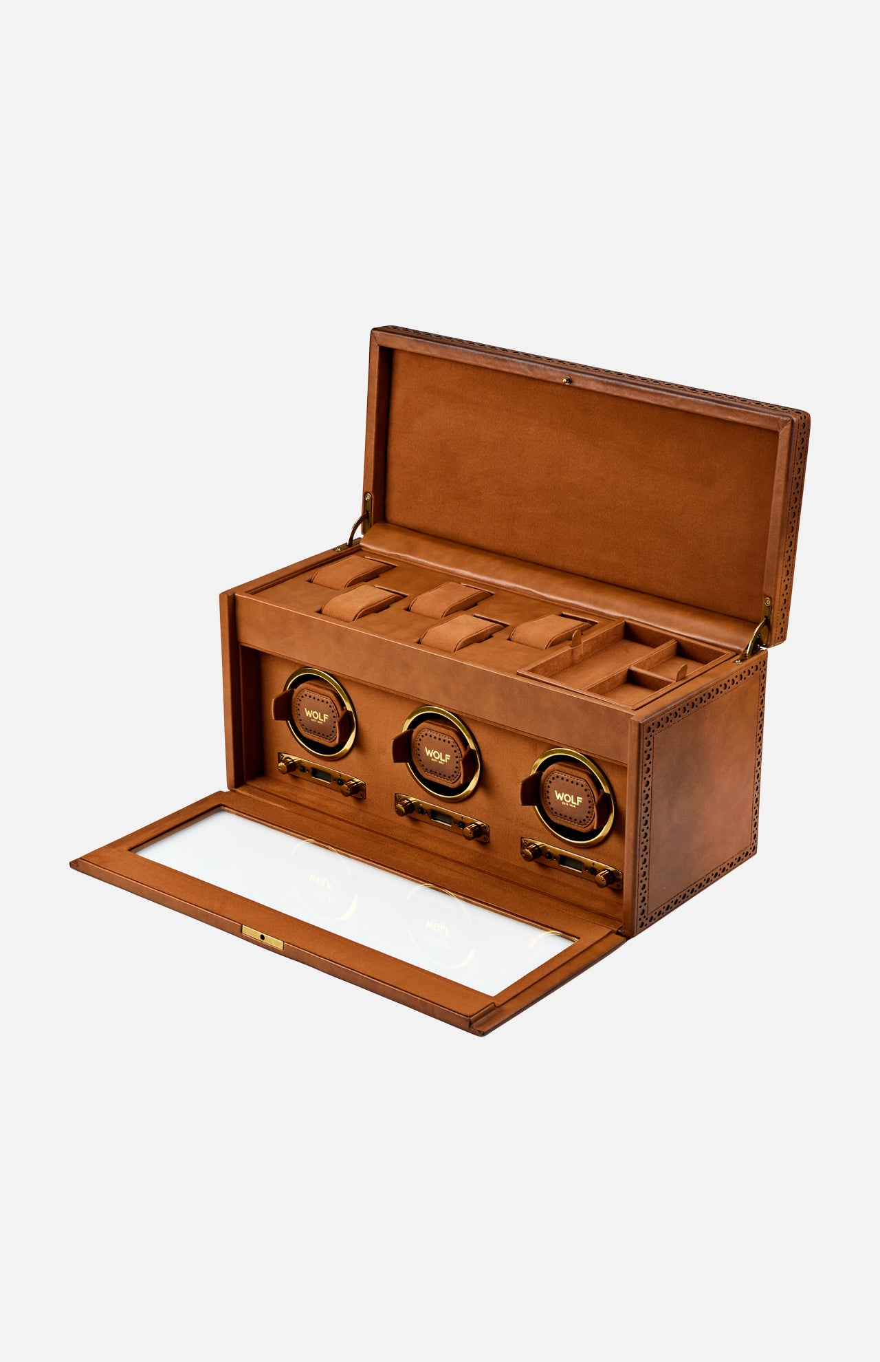 The WOLF Brogue Triple Winder with Storage is a brown leather luxury watch winder box, displayed here with its lid open to showcase a triple watch winder and spacious compartments for additional watch storage. The front panel, featuring a glass window, opens elegantly to reveal the stylish interior.