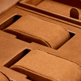 Close-up of the WOLF Brogue Triple Winder with Storage—an elegant brown suede or leather jewelry and watch box featuring multiple compartments and cushioned sections for organizing your collection, perfect for pairing with a luxury triple watch winder.