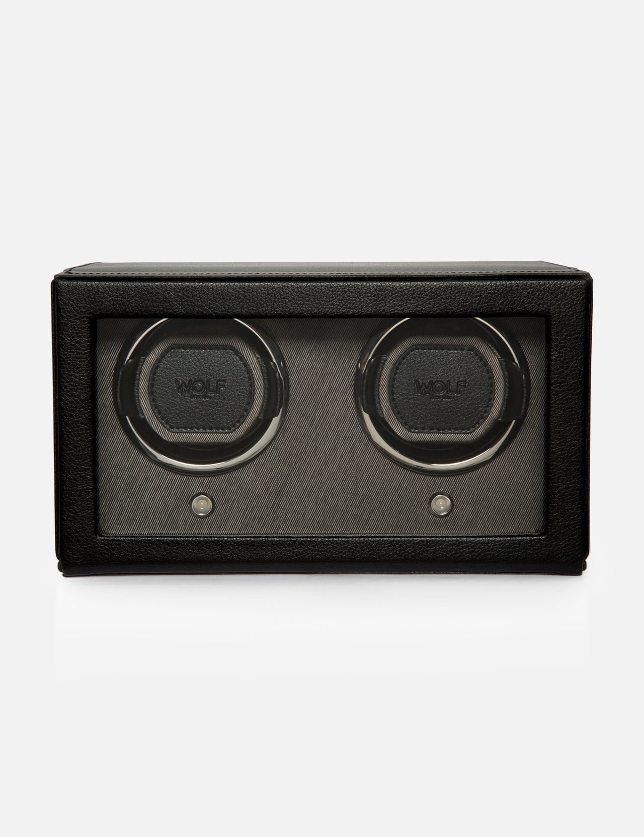 A black rectangular Cub Double Winder with Cover by WOLF, crafted from premium vegan leather, features two circular slots with the WOLF logo displayed on each, a glass front panel, and is photographed against a plain white background. This luxurious design keeps your timepieces flawlessly wound.