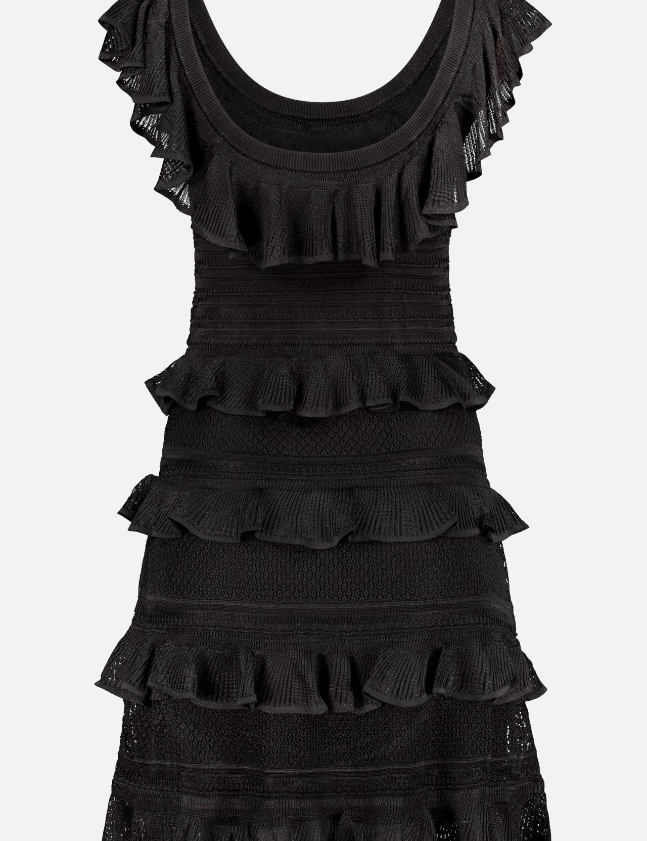 The ZIMMERMANN Illuminate Knit Frill Mini Dress is a sleeveless black mini with a scoop neckline, fitted waist, and layered ruffle details accenting the shoulders, chest, and skirt.