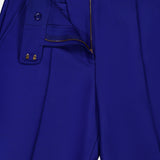 Close-up of cobalt blue Zimmermann Clash Wool Silk Flare Trouser Pants featuring a fly front, hook-and-bar closure, and central stitched seams.