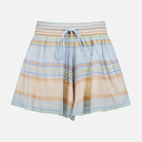 The Indra Stripe Drawstring Short by ZIMMERMANN features a mid-rise, relaxed fit with blue, peach, and tan horizontal stripes and a jeweled drawstring waistband. The light, flowy shorts are shown against a plain white background.