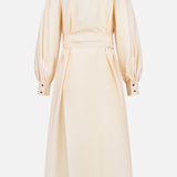 The Luna Obi Silk Midi Dress by ZIMMERMANN, seen from the back, has a cream hue, smooth satin-like silk material, a waist belt, wide balloon sleeves with cuffs, and a back vent for an elegant, feminine look.