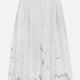 The Mahon Embroidered Midi Skirt by ZIMMERMANN features a fitted elastic waistband, delicate floral cutout embroidery at the hem, and a scalloped edge, creating a light, flowy cotton skirt perfect for summer.