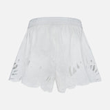 The ZIMMERMANN Mahon Embroidered Drawstring Short in ivory cotton features a comfortable elastic waistband, delicate floral embroidery, and cutout details on the sides, shown against a plain white background.