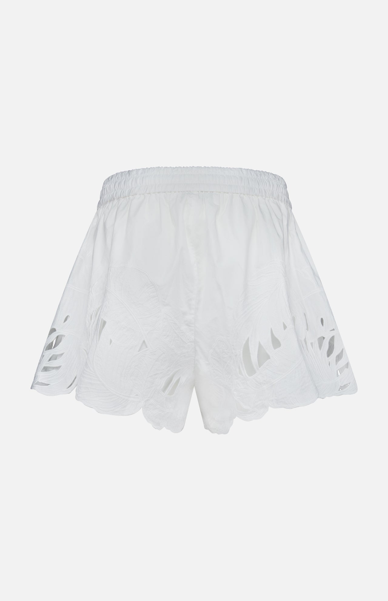 The ZIMMERMANN Mahon Embroidered Drawstring Short in ivory cotton features a comfortable elastic waistband, delicate floral embroidery, and cutout details on the sides, shown against a plain white background.