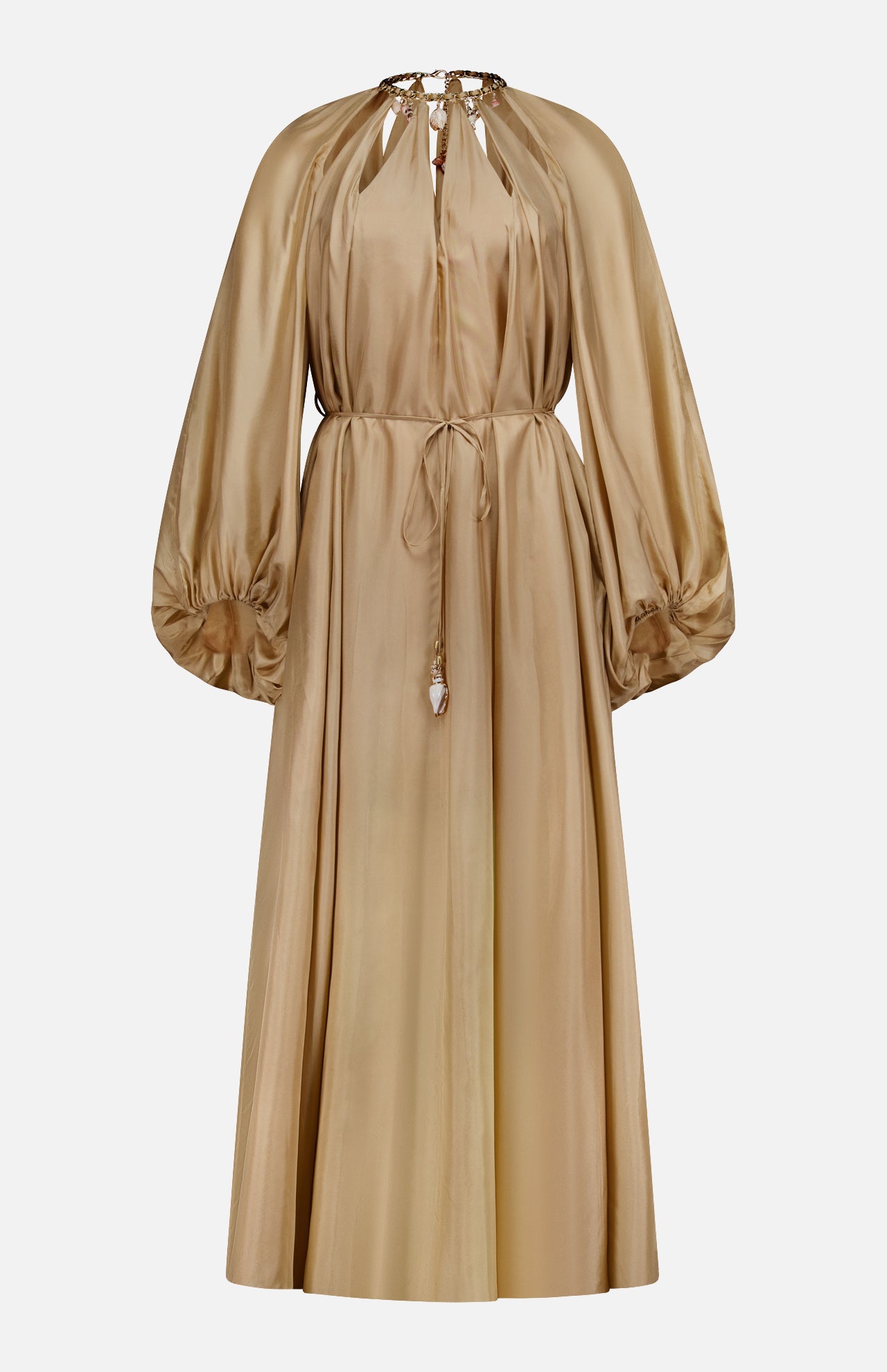The Mahon Shell Charms Maxi Dress by ZIMMERMANN is a long-sleeved gold silk habutae dress with a cinched waist, gathered neckline, full billowy sleeves, keyhole neck detail, and tasseled waist tie.