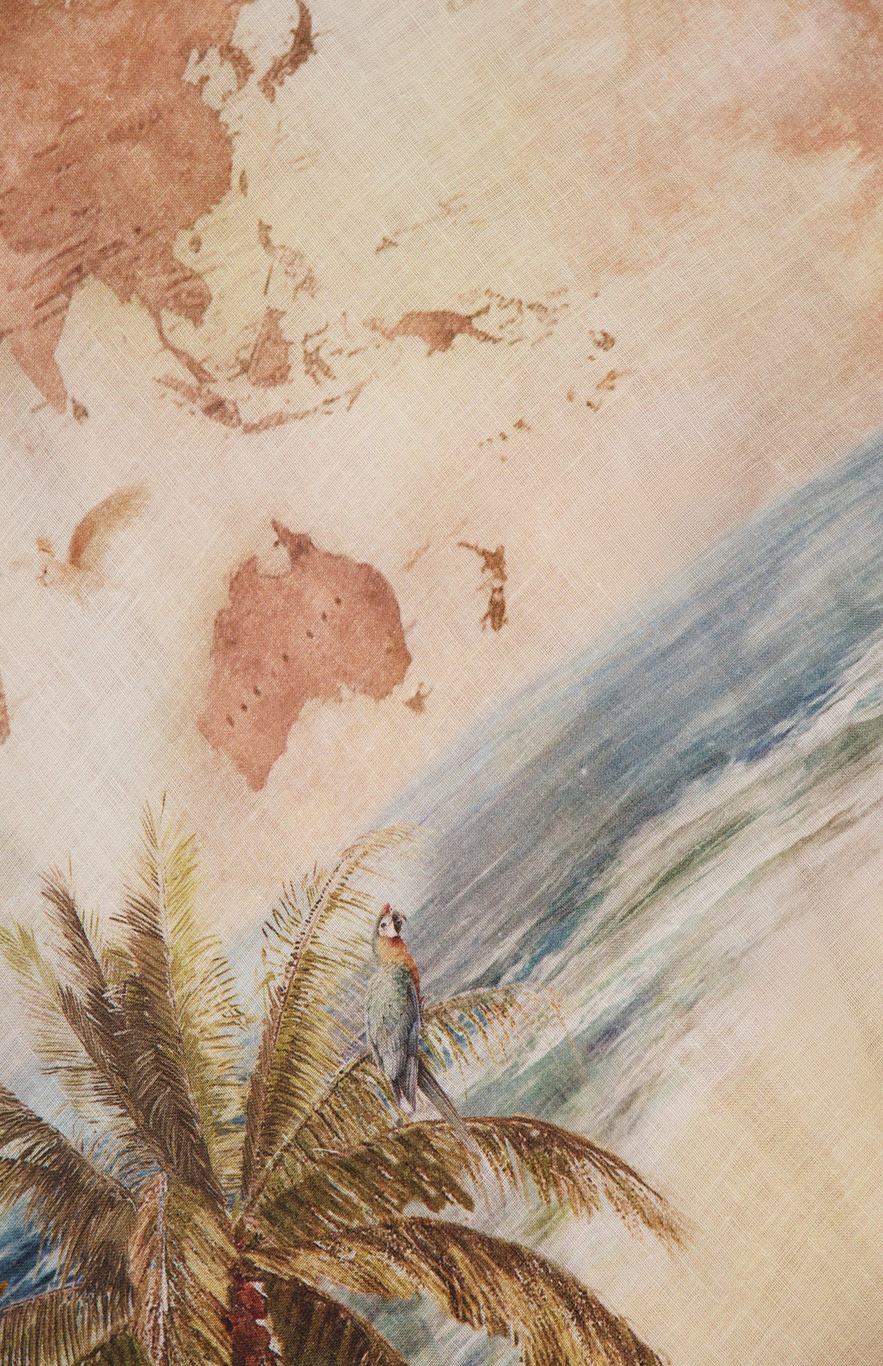 An illustrated map of Australia and nearby regions sits above an ocean scene with a parrot on a palm tree—capturing the spirit of ZIMMERMANN's Mahon Seashell Charm Picnic Dress for your next stylish adventure.