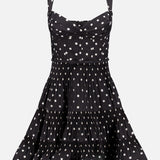 The ZIMMERMANN Pleated Draped Mini Dress features a fitted bodice, sweetheart neckline, and flared tiered skirt with ruffled hem—an ideal party dress for any fun occasion.