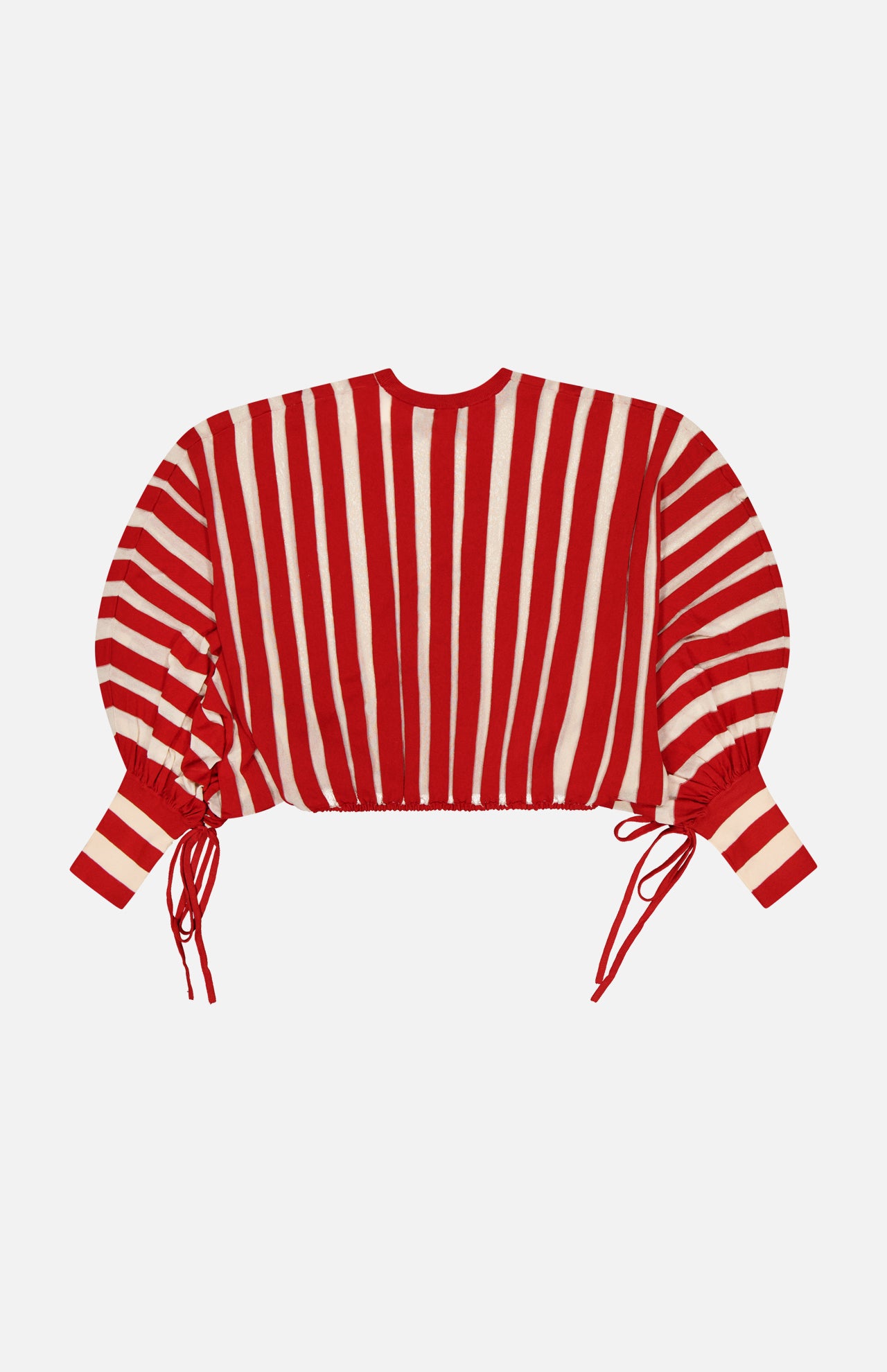 The ZIMMERMANN Rebellion Drawn Cuff Sweater is a red and cream striped, cropped sweater with long blouson sleeves and adjustable cuff ties, shown against a white background.