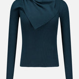 A Valiant Merino Scarf Collar Top by ZIMMERMANN in teal, featuring ribbed long sleeves and a matching scarf draped around the neck, displayed on a plain white background.