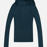A long-sleeved, ribbed Valiant Merino Scarf Collar Top by ZIMMERMANN in dark teal, featuring a loose turtleneck scarf collar, is laid flat on a light background.