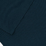 Close-up of the ZIMMERMANN Valiant Merino Scarf Collar Top in dark blue, featuring a striking texture contrast between the smooth and ribbed sections.