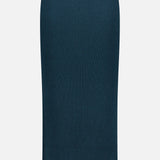 The Valiant Merino Straight Midi Skirt by ZIMMERMANN is displayed against a white background. This high-waisted, dark teal skirt features a long, ribbed design with a slim, straight silhouette and an elastic waistband, offering a clean look without visible embellishments or fastenings.