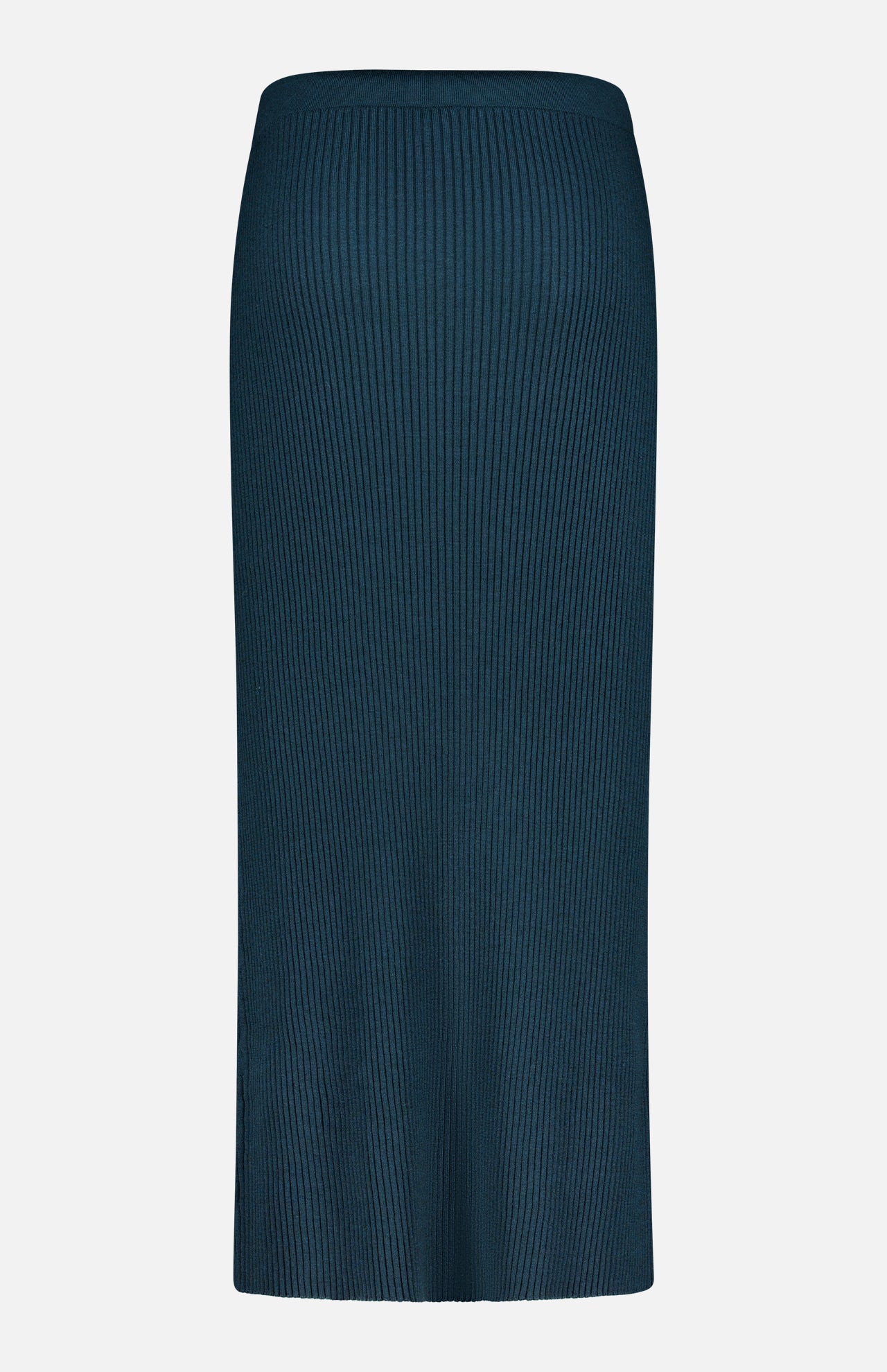 ZIMMERMANN’s Valiant Merino Straight Midi Skirt, featuring a dark teal hue, ribbed knit merino wool construction, straight silhouette, elastic waistband, and minimal design, is displayed on a plain white background.
