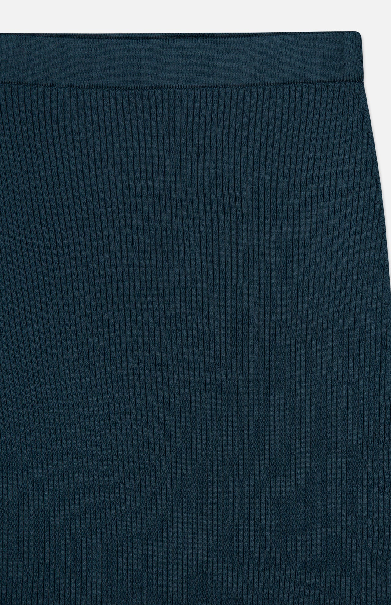 Close-up of the Valiant Merino Straight Midi Skirt by ZIMMERMANN in dark teal, highlighting the vertically ribbed knit texture and a portion of the waistband at the top.